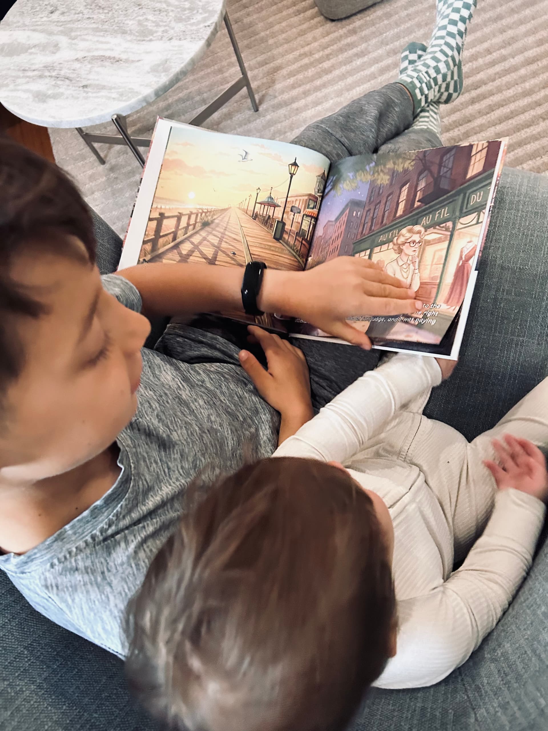 A printed Family Hero Book about a grandmother resting on a kitchen counter